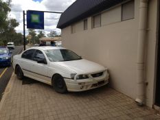 Drunken Driver Crashes into Wall