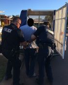 Two arrested for online fraud - Darwin