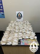 Image of seized substances and cash