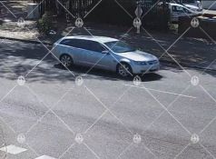 Image of silver station wagon.