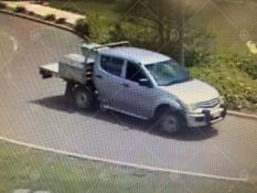 Silver Mitsubishi Triton,
