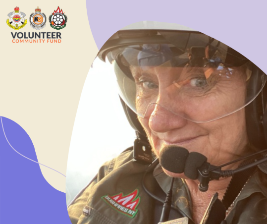 Christine Platell, Bushfires NT volunteer - Christine is wearing a helmet with microphone and safety glasses.